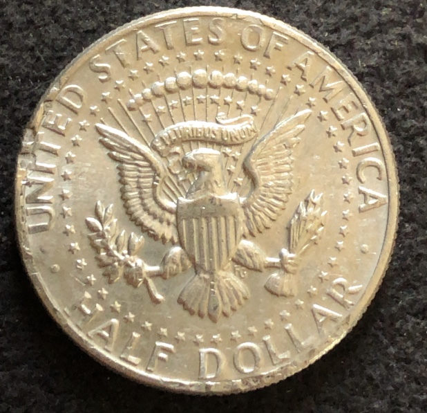 1980-D-Kennedy-Half-With-Small-Hole-On-Reverse-At-Shield?